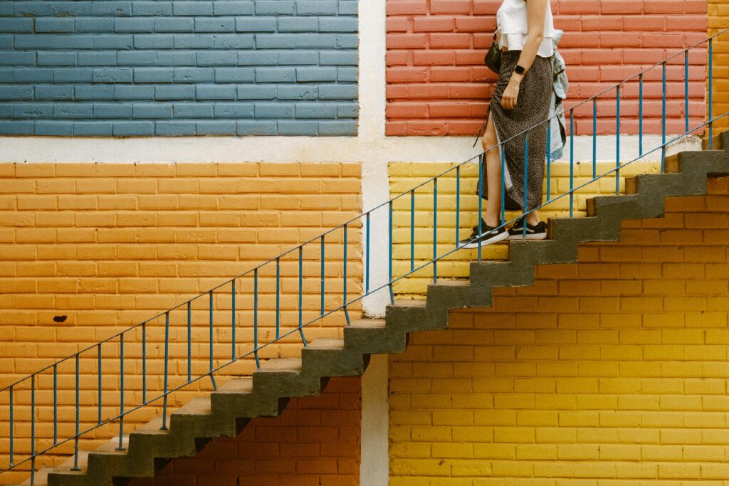 A person climbing stairs as a simple exercise to improve your heart health